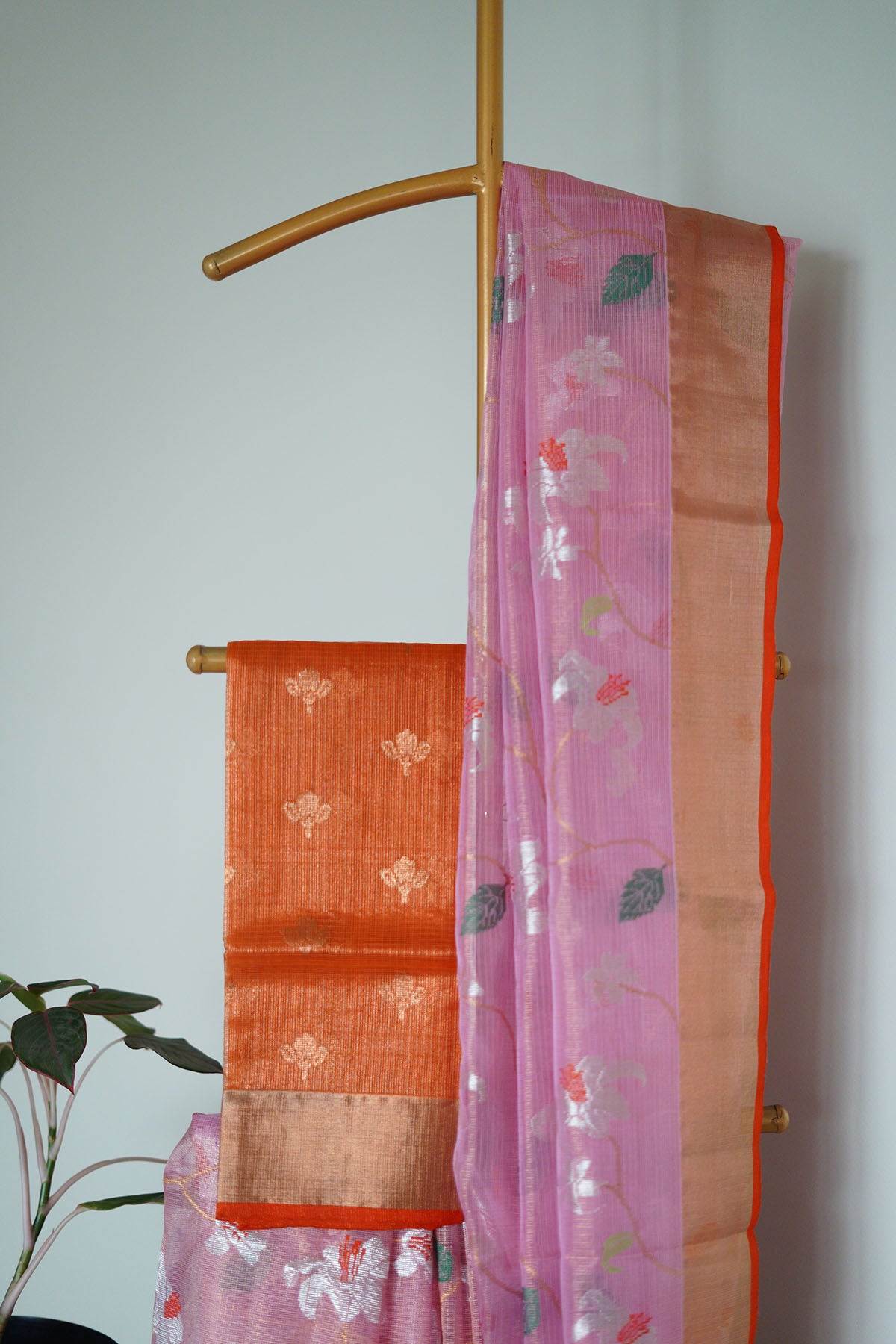 Rose pink single tissue saree in floral with a beautiful orange saree