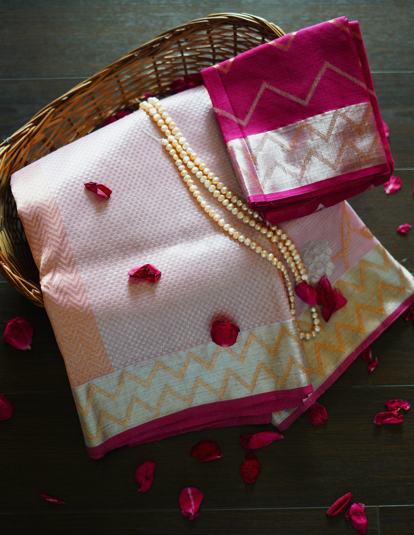 Baby Pink Saree Blooms with Floral Jaal and A Zigzag Border