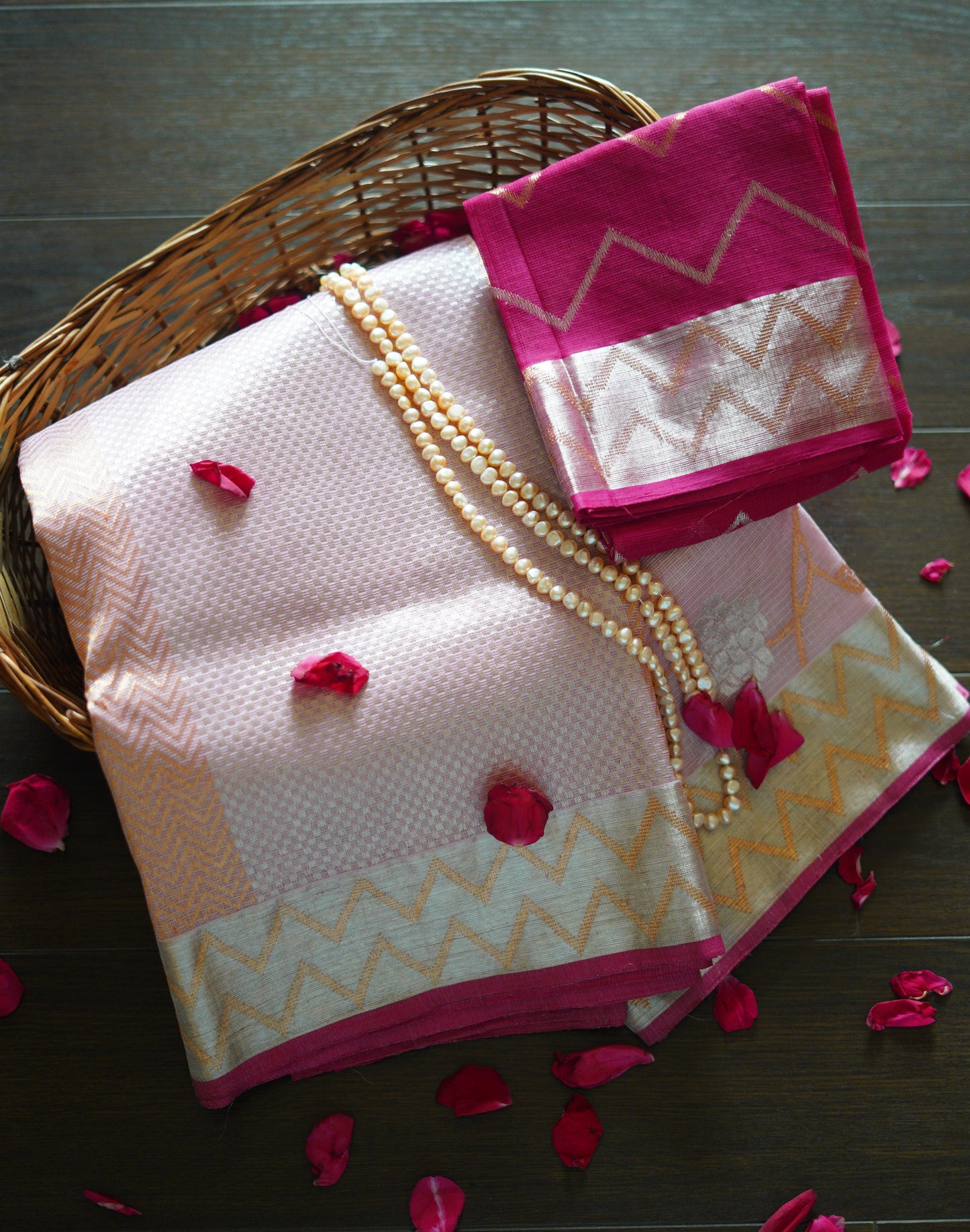 Baby Pink Saree Blooms with Floral Jaal and A Zigzag Border