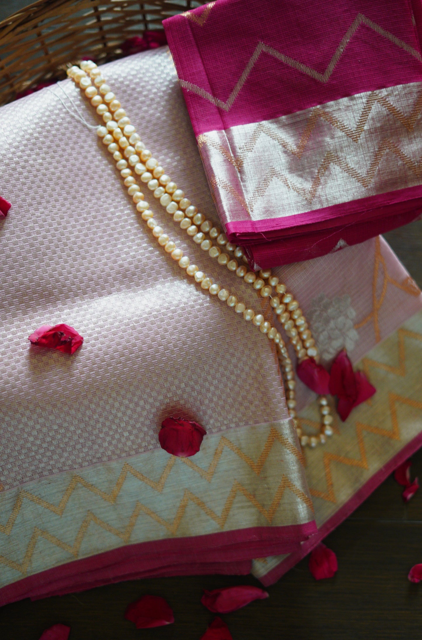 Baby Pink Saree Blooms with Floral Jaal and A Zigzag Border