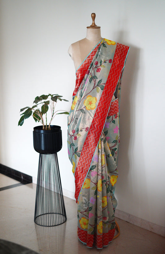 Double Tissue Blue Saree with A Red Zigzag Border