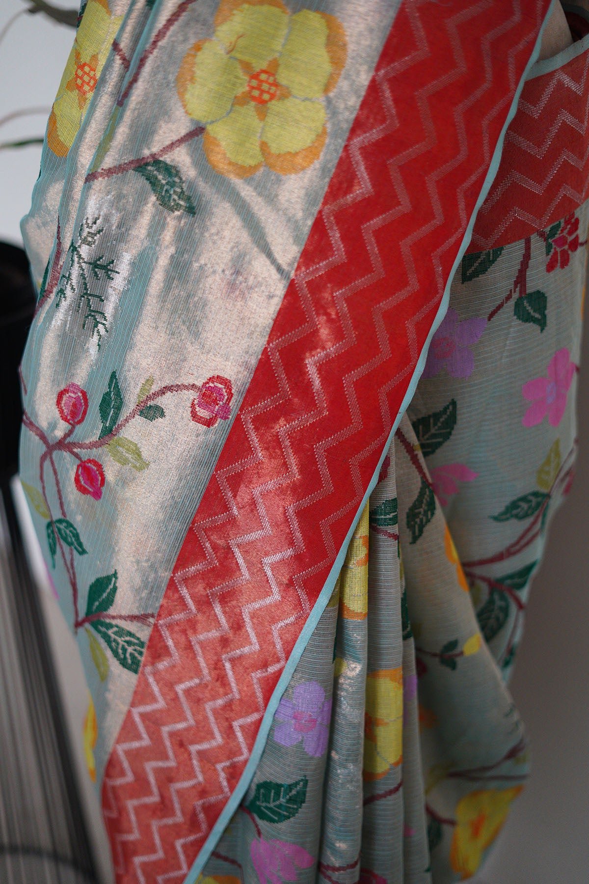 Double Tissue Blue Saree with A Red Zigzag Border