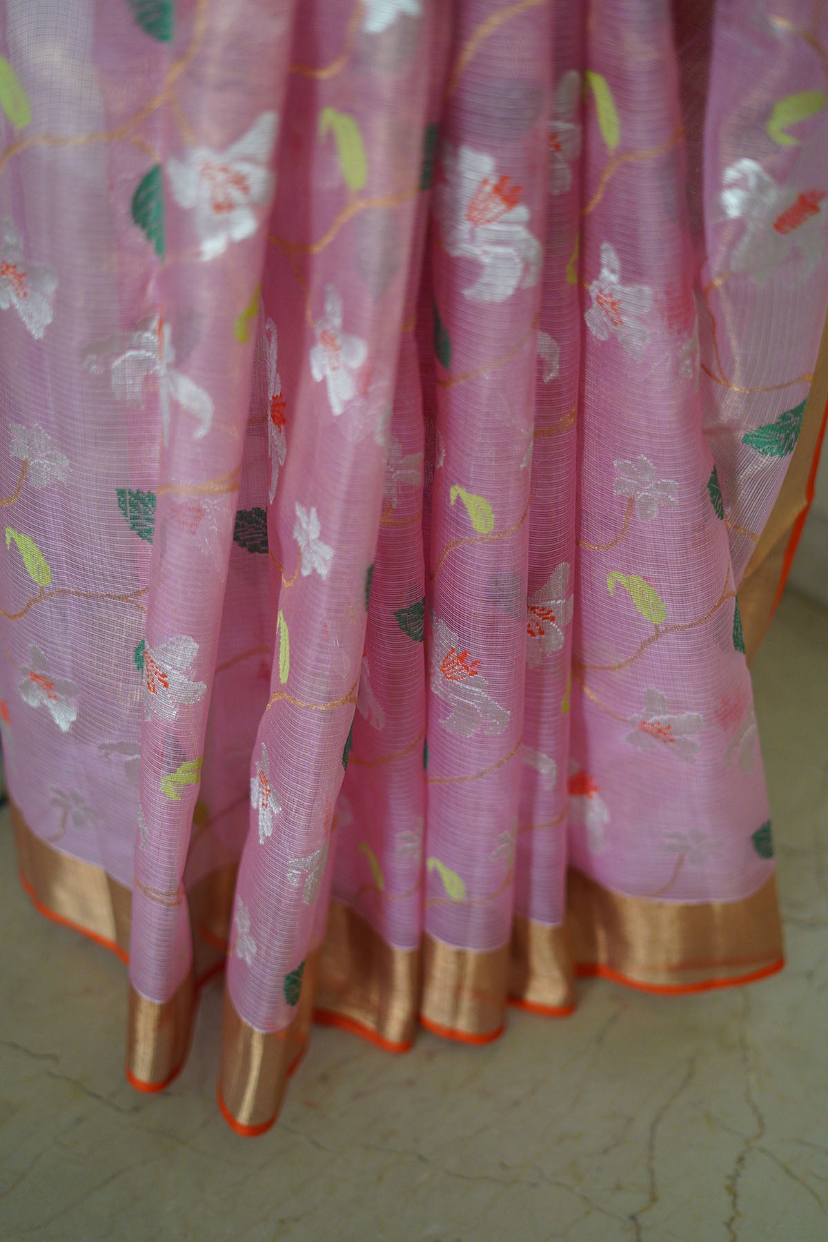 Rose pink single tissue saree in floral with a beautiful orange saree