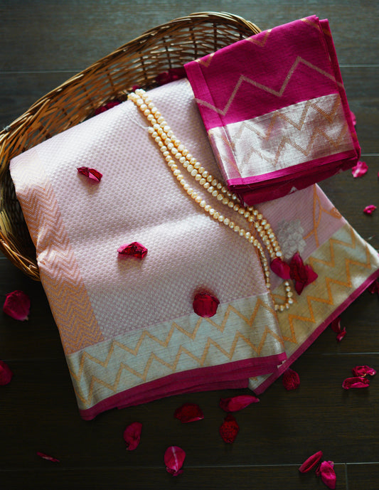 Baby Pink Saree Blooms with Floral Jaal and A Zigzag Border